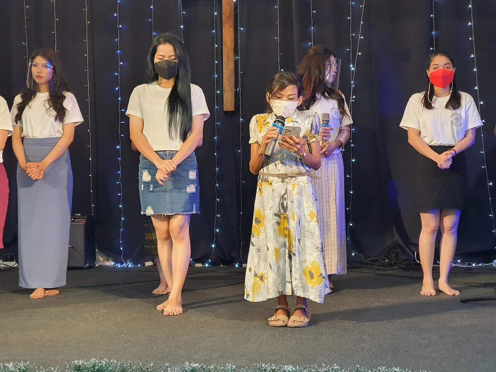 Naleng Real leading worship at Good News of Jesus Church